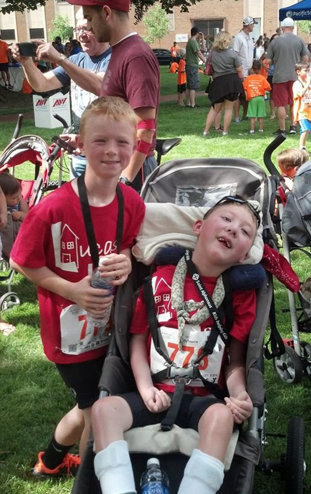 8-Year-Old Hero Carried His Disabled Younger Brother Through An Entire Triathlon
