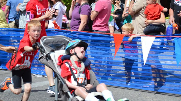 8-Year-Old Hero Carried His Disabled Younger Brother Through An Entire Triathlon
