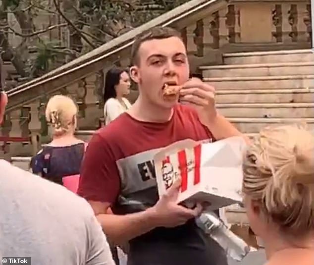 Man Eats KFC Wings In The Middle Of Vegan Protest