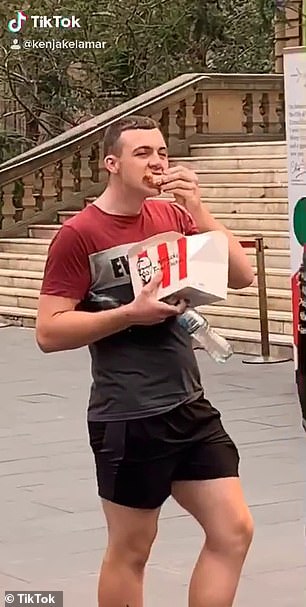 Man Eats KFC Wings In The Middle Of Vegan Protest
